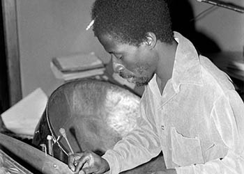 Clyde with steel drums No. 3   -   Oak Park, IL, 1983   -   Kodak Tri-X black & white 35mm film