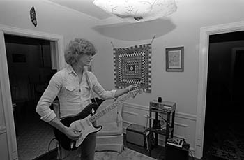 Paul Braucher tuning up   -   Oak Park, IL, 1982   -   Kodak Tri-X black & white 35mm film