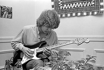 Paul Braucher with Stratocaster   -   Oak Park, IL, 1982   -   Kodak Tri-X black & white 35mm film