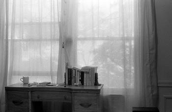 Window with books   -   Oak Park, IL, 1982   -   Kodak infrared black & white 35mm film