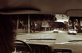 Rear-view mirror No. 2   -   Oak Park, IL, 1982   -   Ilford XP-1 chromogenic black & white 35mm film