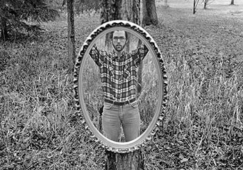 Self-portrait among trees   -   Adrian, MI, 1982   -   Kodak Tri-X 120 film