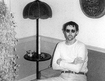 Self-portrait with round glasses   -   Adrian, MI, 1984   -   Kodak infrared black & white 35mm film