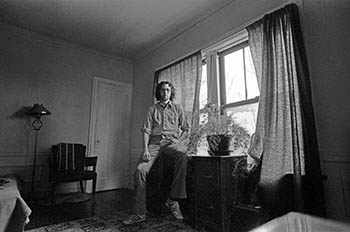 Self-portrait on desk   -   Oak Park, IL, 1982   -   Ilford HP5 Plus black & white 35mm film
